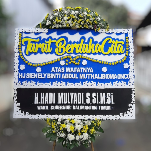 Karangan Bunga Duka  karo
